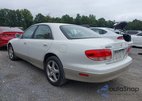 2001 Mazda Millenia S z USA, uszkodzony, nr VIN JM1TA222511713119
